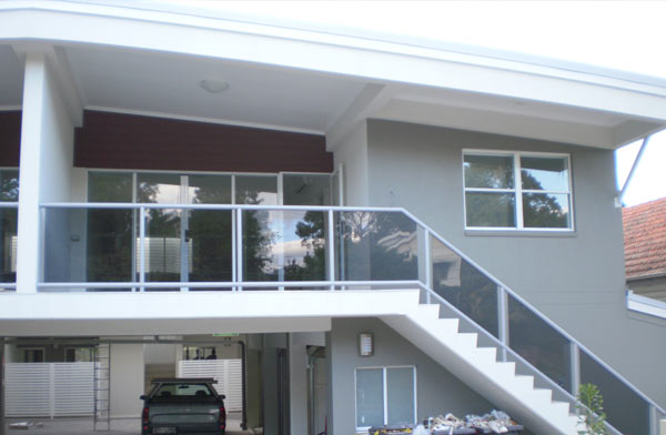 Glass and aluminium balustrade on a modern two-storey house