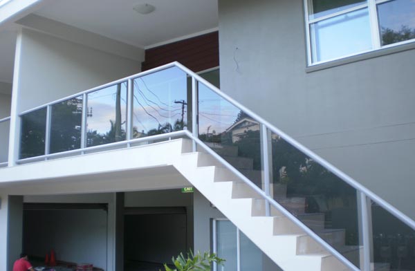 Glass balustrade running up an external staircase